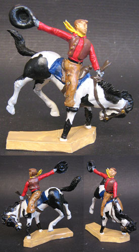 Cowboy breaking in a wild horse, fully painted